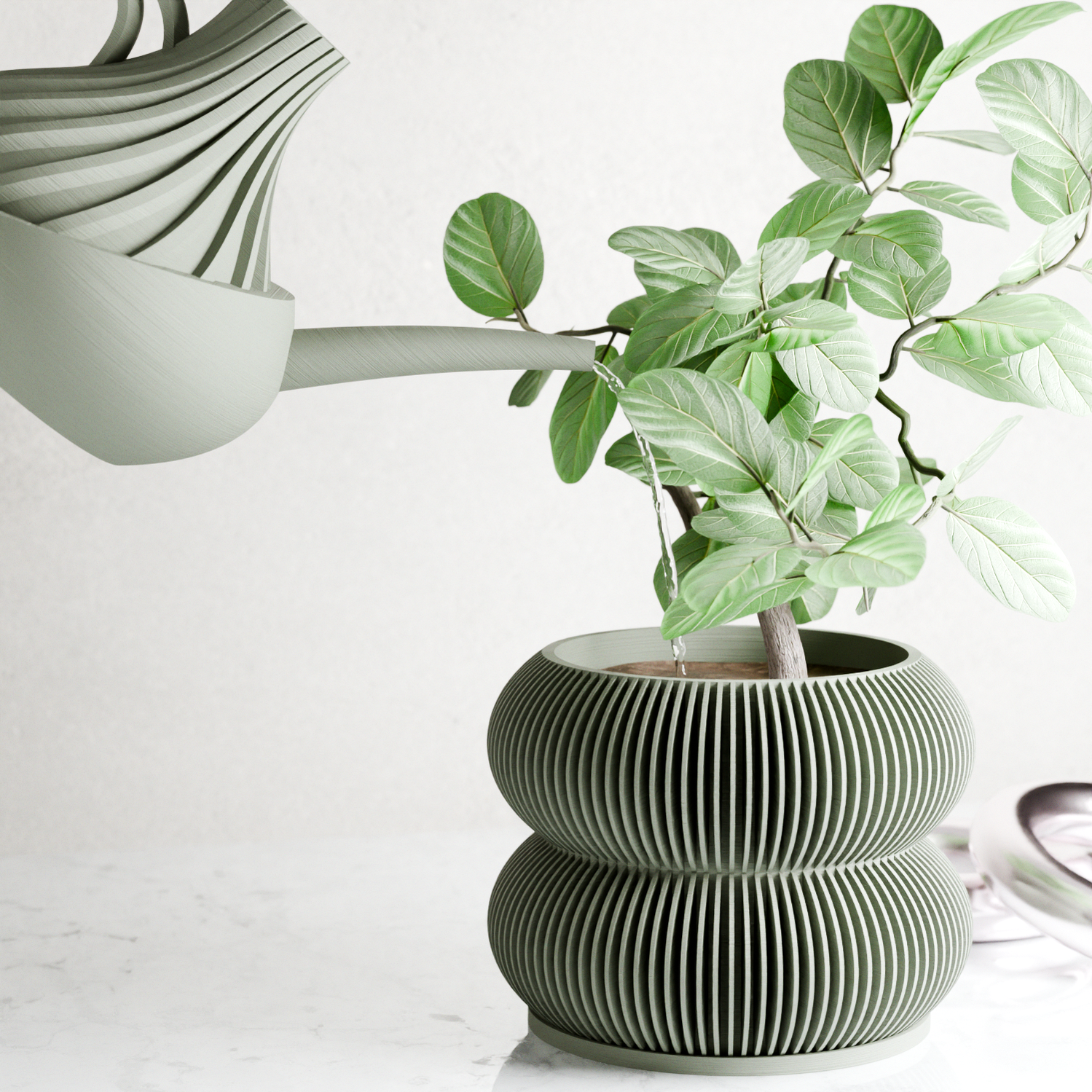 REVOLVE Watering Can